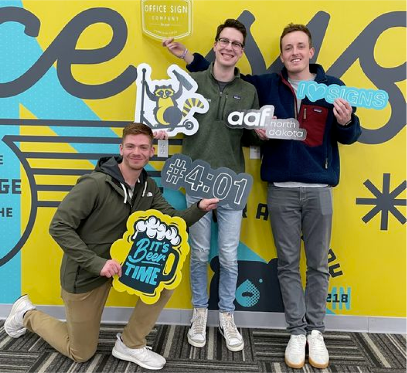 Image of the AdShark team at the 4:01 networking event at Office Sign Company in Fargo, North Dakota. From left to right: Nick Due, Nick Loock, Jack Yakowicz.