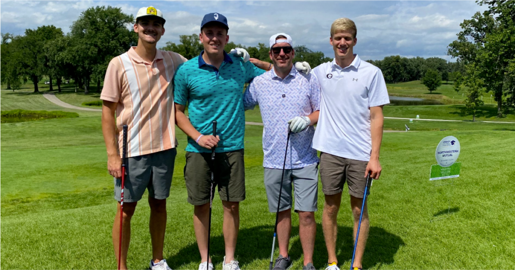 The AdShark team plays in the Legacy Children's Foundation's Golf Tournament.