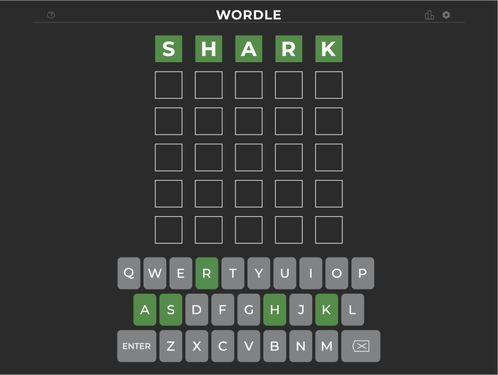 Graphic showing the wordle website with "Shark" filled in as the answer